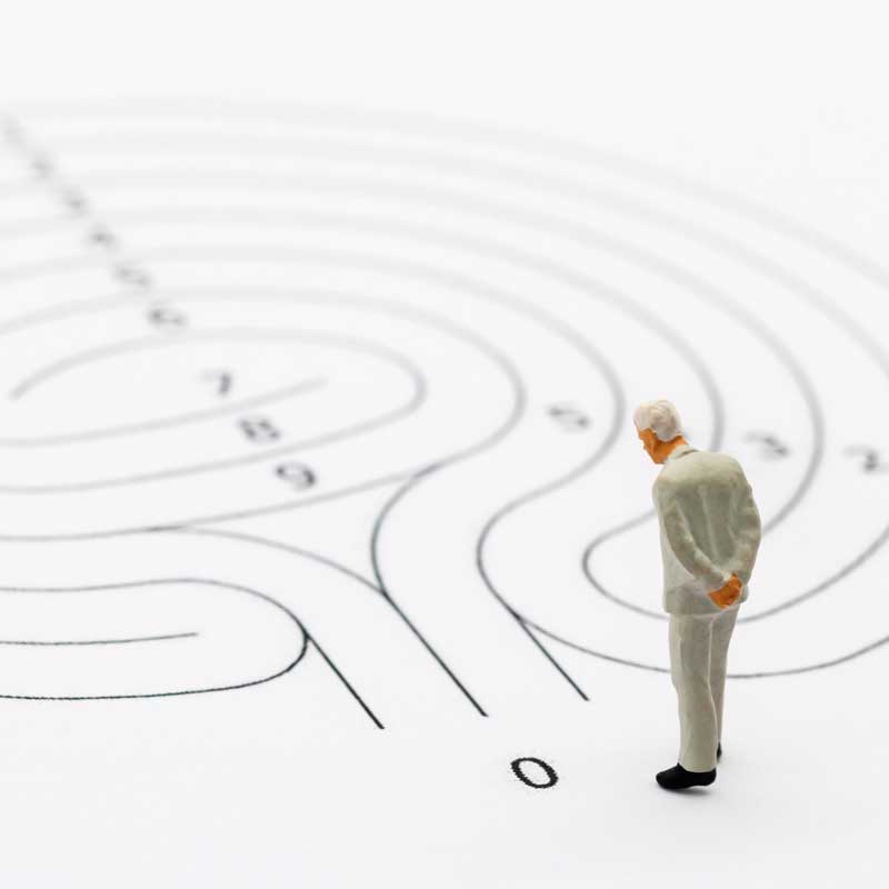 illustration of an elderly gentlemen puzzling over a labyrinth, representing the needs for 401k advisors and financial planners for retirement.